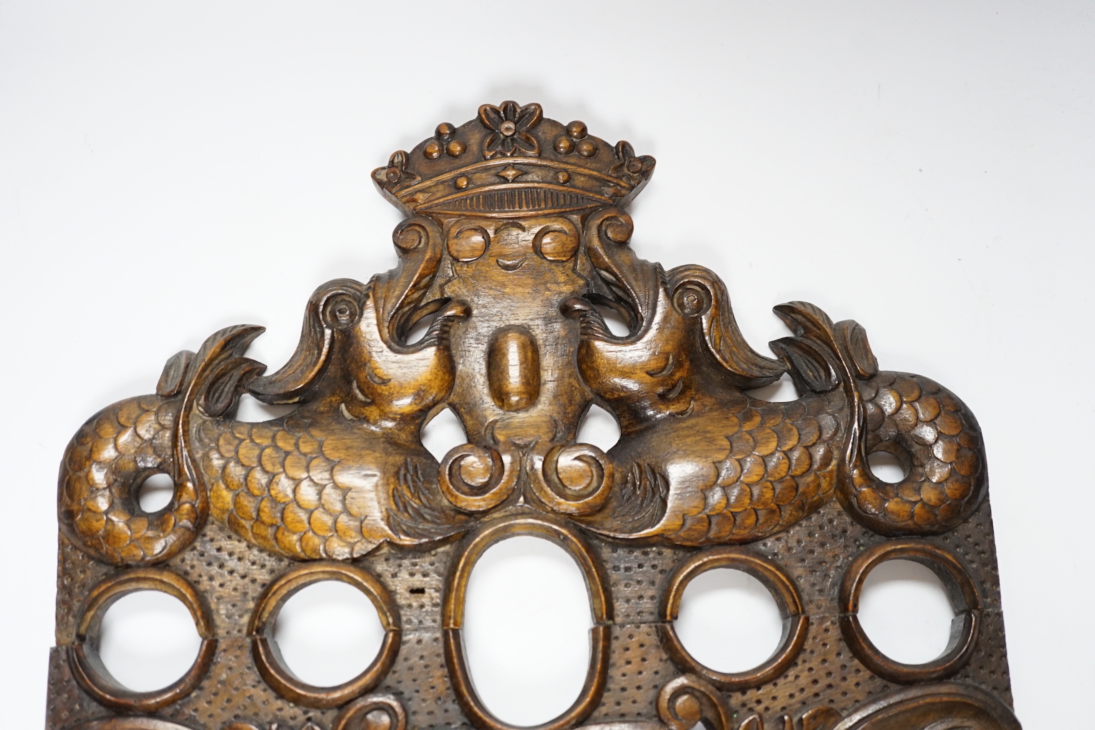 An 18th century style carved walnut armorial plaque, 28.5x32cm
